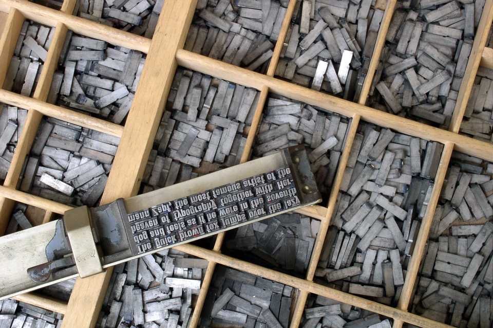 Movable metal type, and composing stick, descended from Gutenberg's press. Photo by Willi Heidelbach. Licensed under CC BY 2.5 Movable metal type, and composing stick, descended from Gutenberg's press. Photo by Willi Heidelbach. Licensed under CC BY 2.5